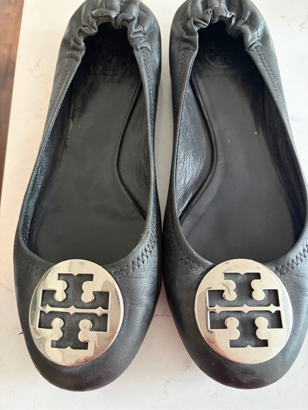 Tory Burch Black Leather Reva Ballet Flats with Silver Logo Medallions
